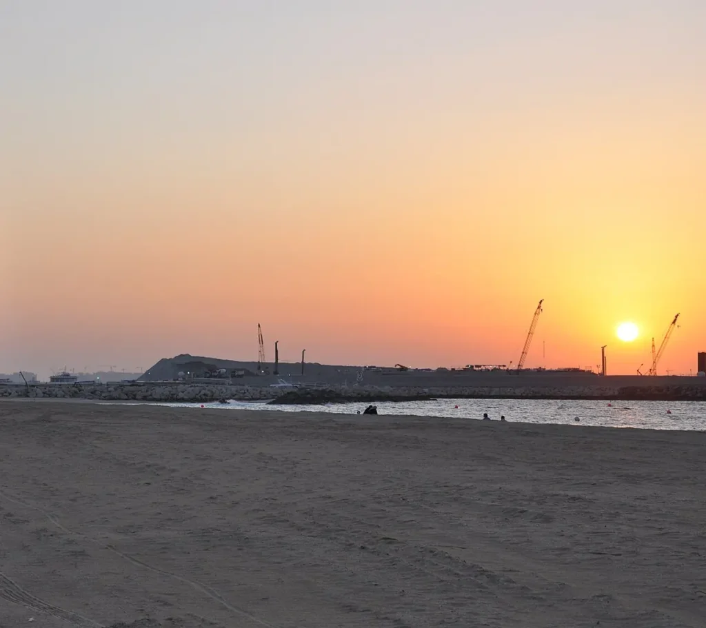 Sunset behind Burj Al Arab at Umm Suqeim Beach Dubai
